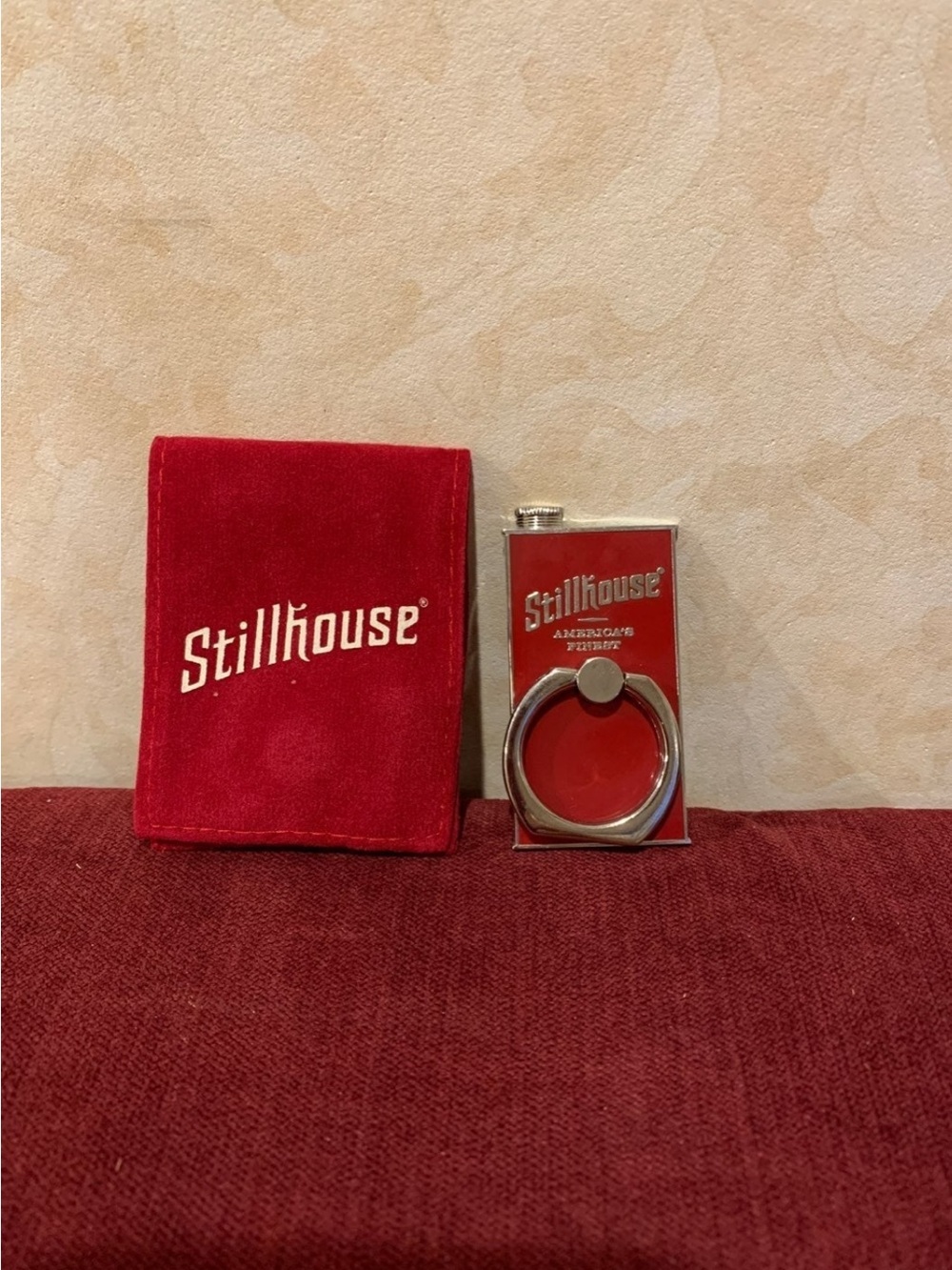 Unique cell  phone metal ring holder with a velvet bag from Stillhouse